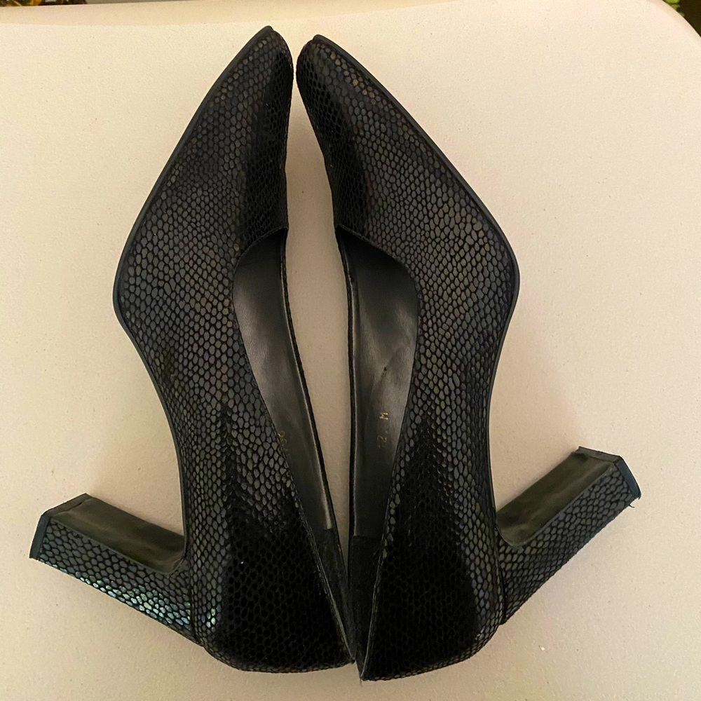 Pumps in excellent used condition. Size 12 M